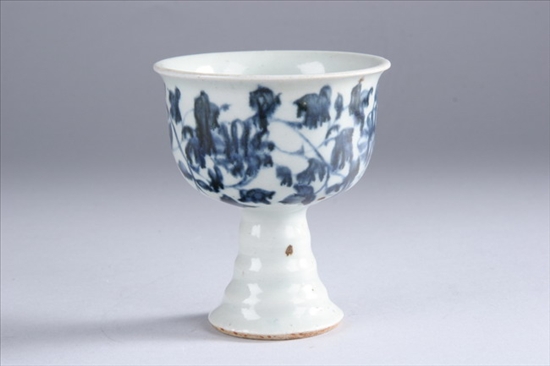 Appraisal: CHINESE BLUE AND WHITE PORCELAIN STEM CUP Floral decoration -