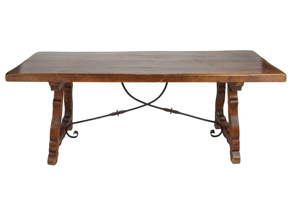 Appraisal: COUNTRY TRESTLE DINING TABLEwith iron stretcher Condition nicks and scratched