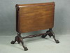 Appraisal: TUCK-AWAY TABLE - EDWARDIAN PERIOD CENTER ROLL DOUBLE DROP LEAF