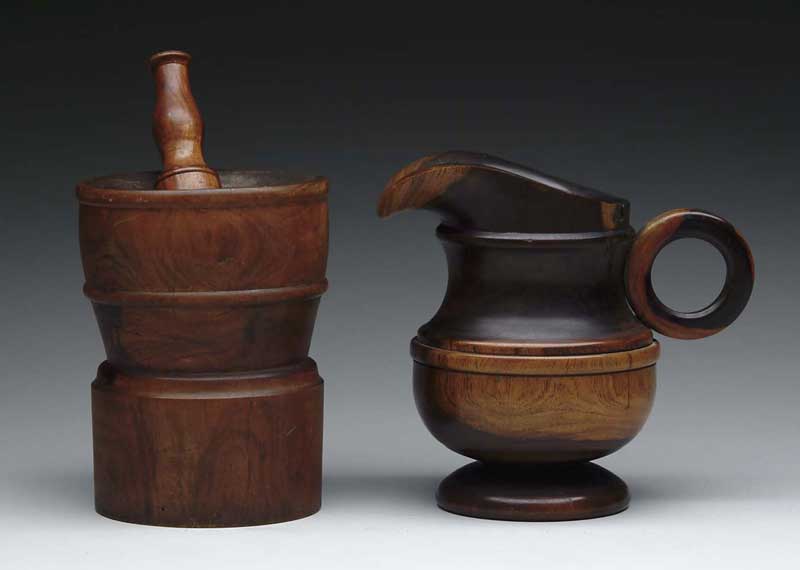 Appraisal: THREE PIECES OF LIGNUM VITAE - h footed pitcher with