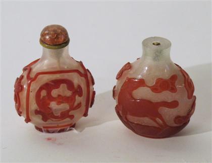 Appraisal: Two Chinese red on 'snow flake' glass snuff bottles th