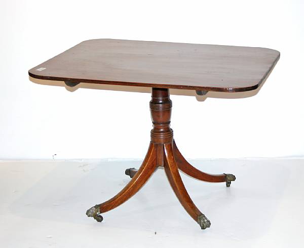 Appraisal: A George III style mahogany tilt top breakfast table height