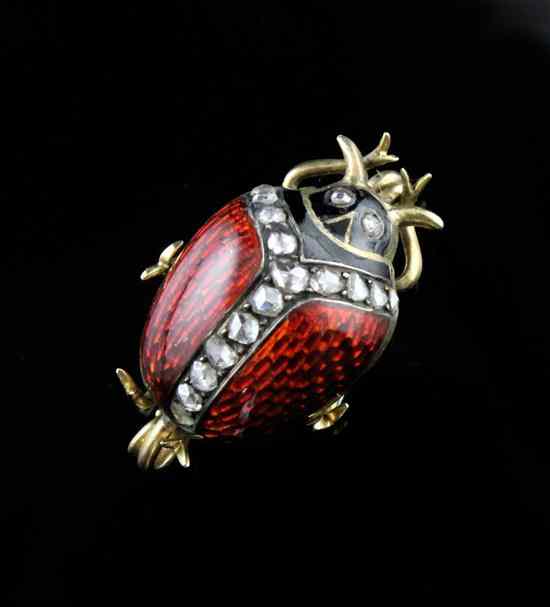 Appraisal: A Victorian rose diamond set enamelled gold ladybird brooch in