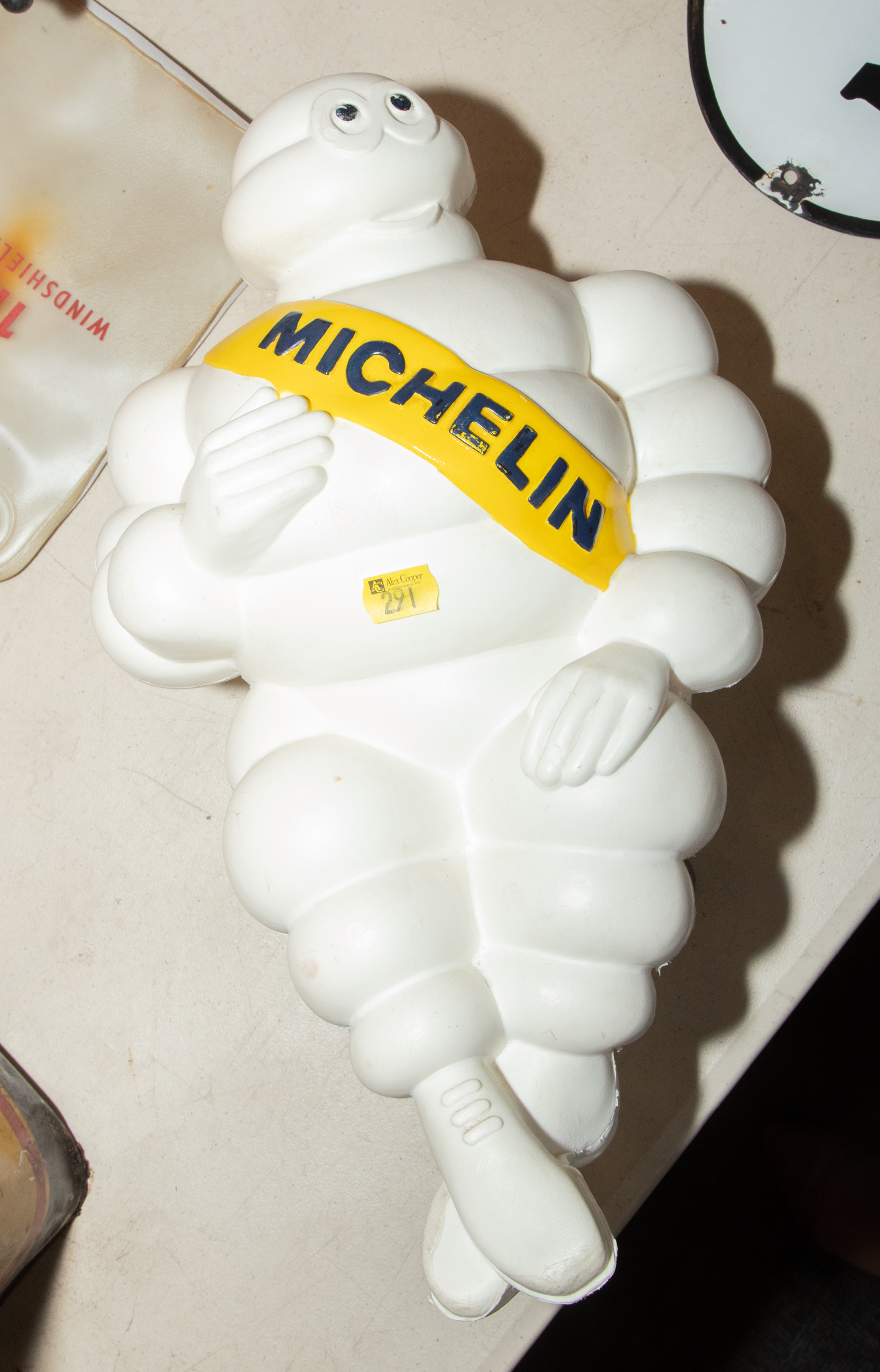 Appraisal: MOLDED PLASTIC MICHELIN MAN TRUCK MASCOT With mounting hardware in