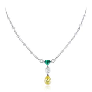 Appraisal: An Art Deco Natural Fancy Vivid Yellow Diamond and Emerald