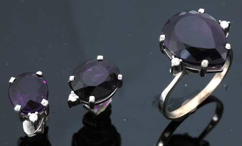 Appraisal: An amethyst and diamond ring and earring suite The ring