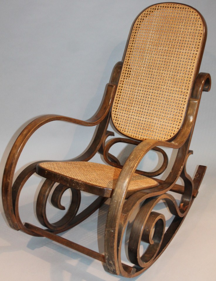 Appraisal: An early thC American steamer style rocking chair with bergere