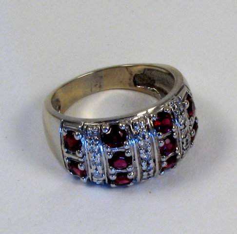 Appraisal: RUBY DIAMOND AND FOURTEEN KARAT WHITE GOLD RING set with