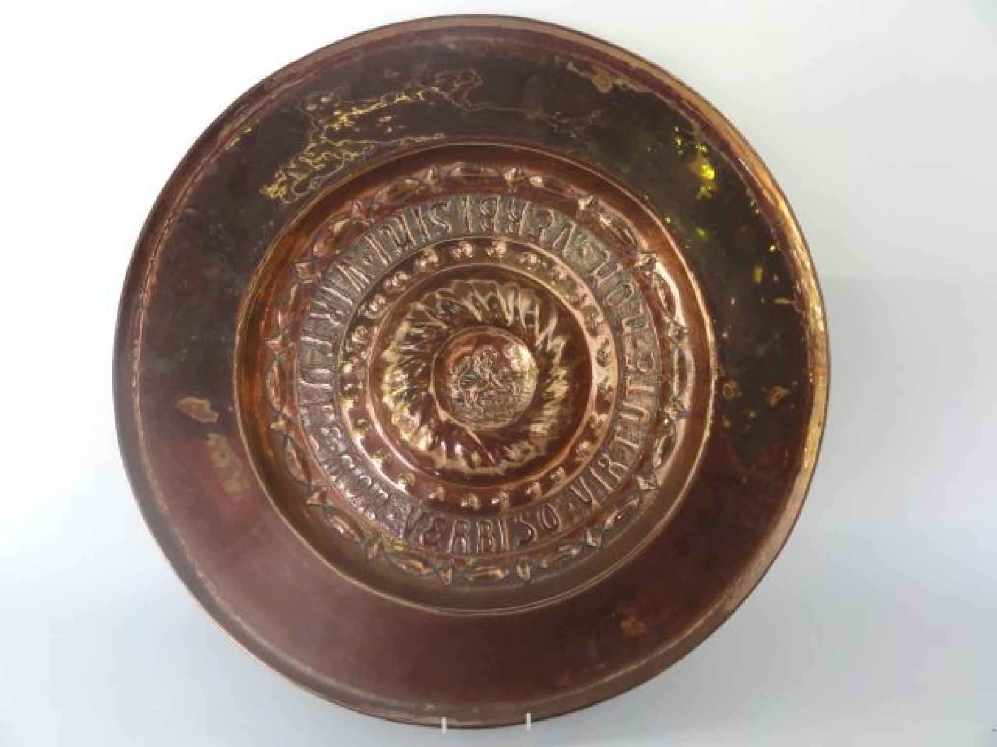 Appraisal: A substantial th century copper charger arms bowl in the