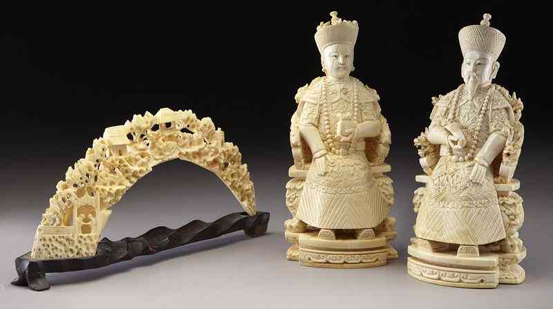 Appraisal: Chinese carved ivory Emperor and Empress ''H International buyers should