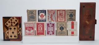 Appraisal: Fifteen Miscellaneous Playing Card Items Including thirteen decks a wooden