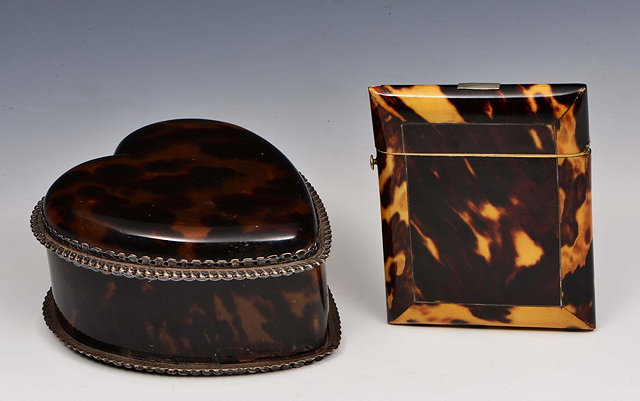 Appraisal: A TORTOISE SHELL AND SILVER MOUNTED TRINKET BOX heart shaped