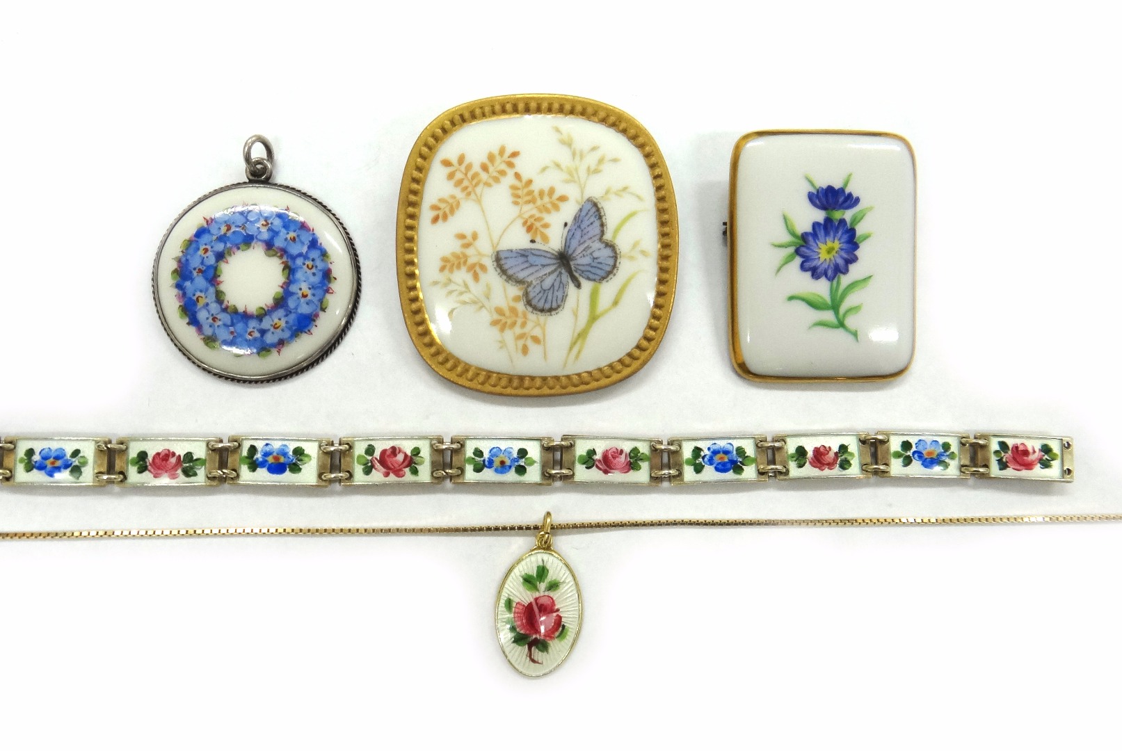 Appraisal: A collection of Continental painted porcelain and enamel jewellery comprising