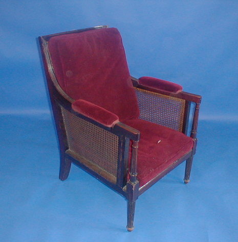 Appraisal: A Regency mahogany library chair with reeded and bergere framing