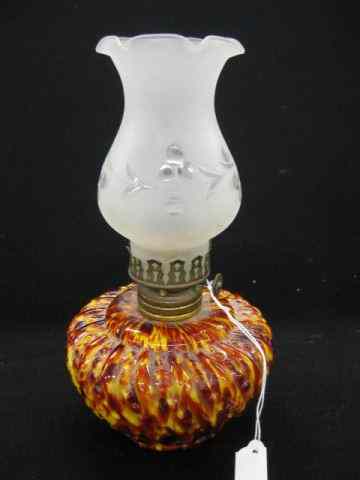 Appraisal: Victorian Art Glass Miniature Oil Lamp rich mottled reds yellow