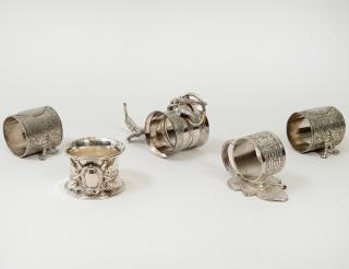 Appraisal: GROUP OF FIVE VICTORIAN SILVER PLATED NAPKIN RINGS American Circa