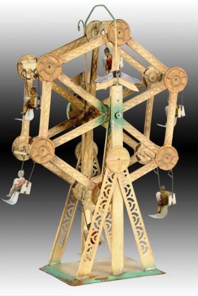 Appraisal: German Tin Wind-Up Ferris Wheel Toy Description Working Six lithographed