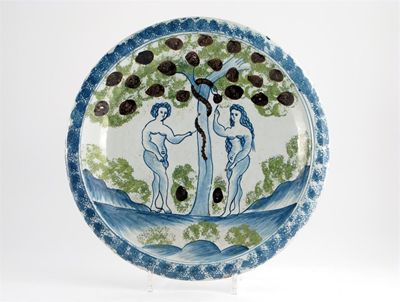 Appraisal: A good Delftware Adam and Eve charger painted and sponged