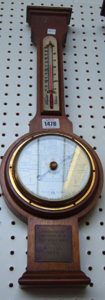 Appraisal: A wheel back barometer mid th century an oak cased