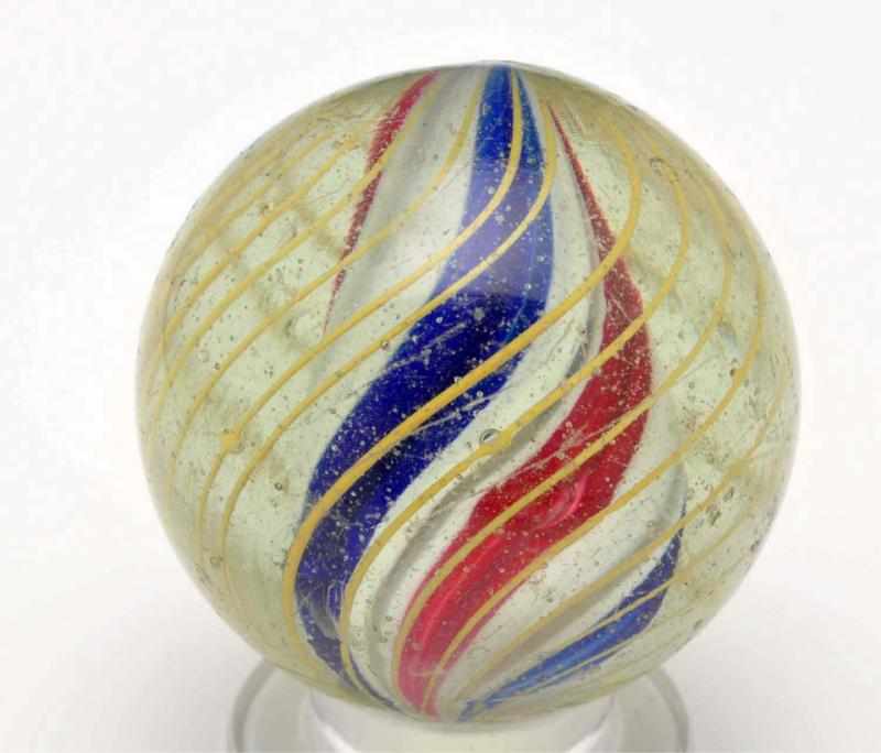 Appraisal: Solid Core Swirl Marble Description Red white and blue solid