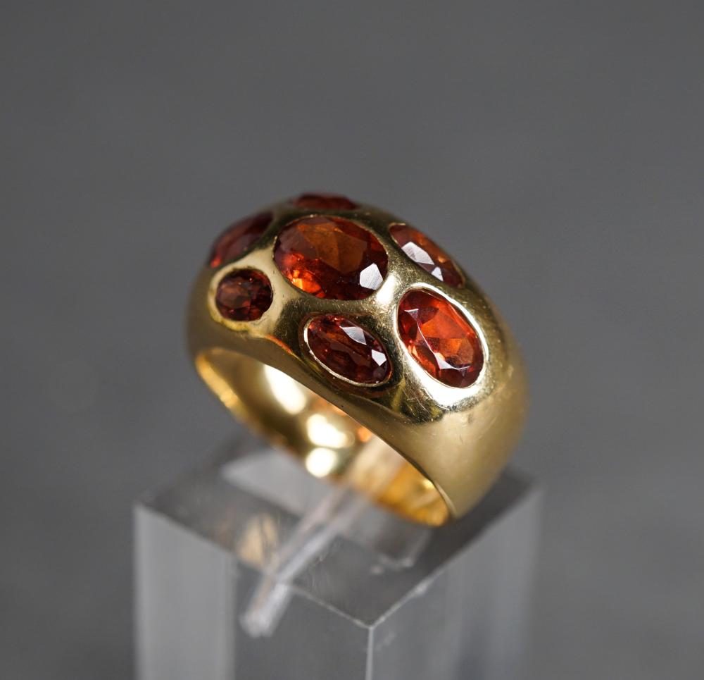 Appraisal: -KARAT YELLOW-GOLD AND GARNET RING GROSS DWT SIZE -Karat Yellow-Gold