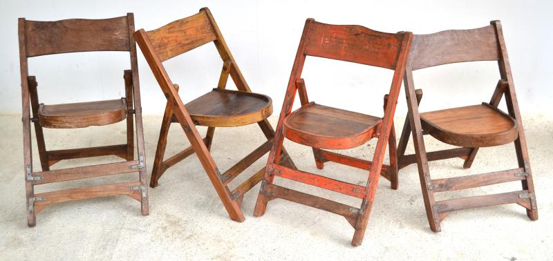 Appraisal: FOUR VINTAGE TIMBER FOLD-OUT CHAIRS FOUR VINTAGE TIMBER FOLD-OUT CHAIRS