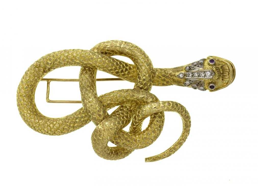 Appraisal: AN ILIAS LALAOUNIS GOLD SERPENT BROOCH the diamond encrusted head