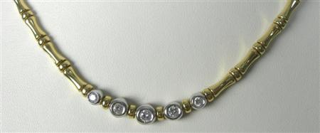 Appraisal: A modern ct two-coloured gold mounted diamond necklace composed of