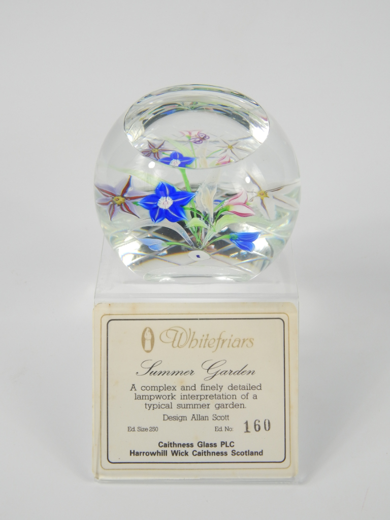 Appraisal: A Whitefriars cut glass paperweight Summer Garden designed by Allan