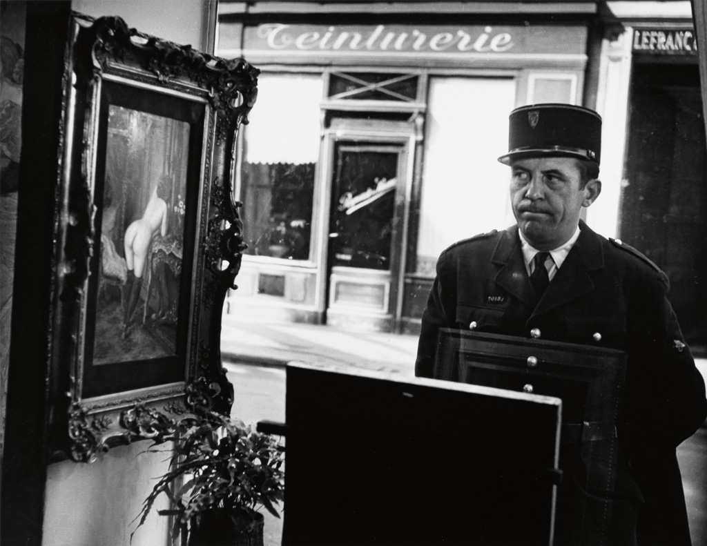 Appraisal: ROBERT DOISNEAU - Un Flic Devant la Vitrine Galerie Romi