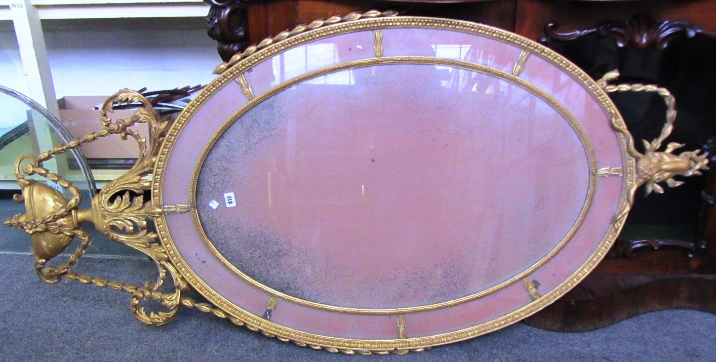 Appraisal: A th century gilt framed oval wall mirror of Adam