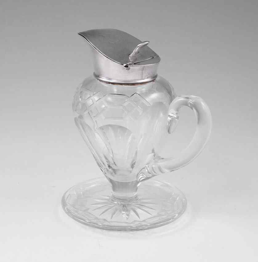 Appraisal: WILCOX STERLING MOUNTED SYRUP JUG Sterling mounted top with cut