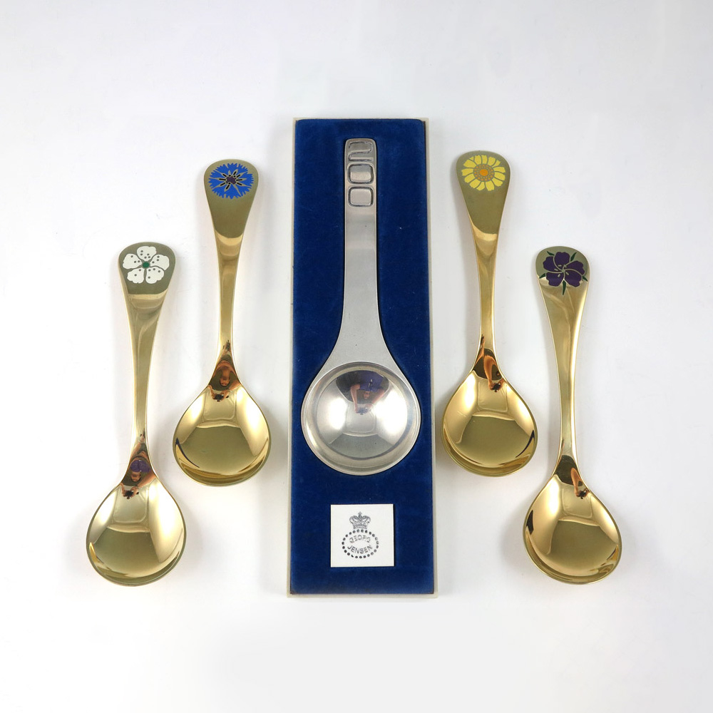 Appraisal: GEORG JENSEN STERLING ANNUAL SPOONS Approx Troy ounces with vermeil