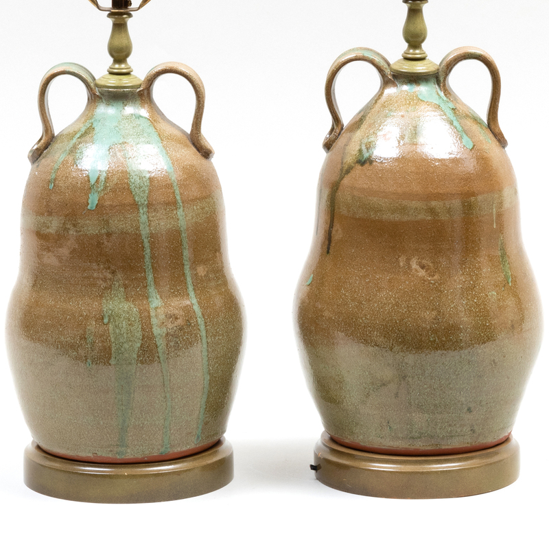 Appraisal: PAIR OF GLAZED EARTHENWARE JARS MOUNTED AS LAMPS The jars