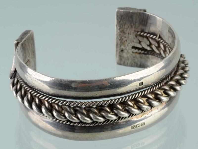 Appraisal: Native American Indian Heavy Silver Bracelet Description Braided design Hallmarked