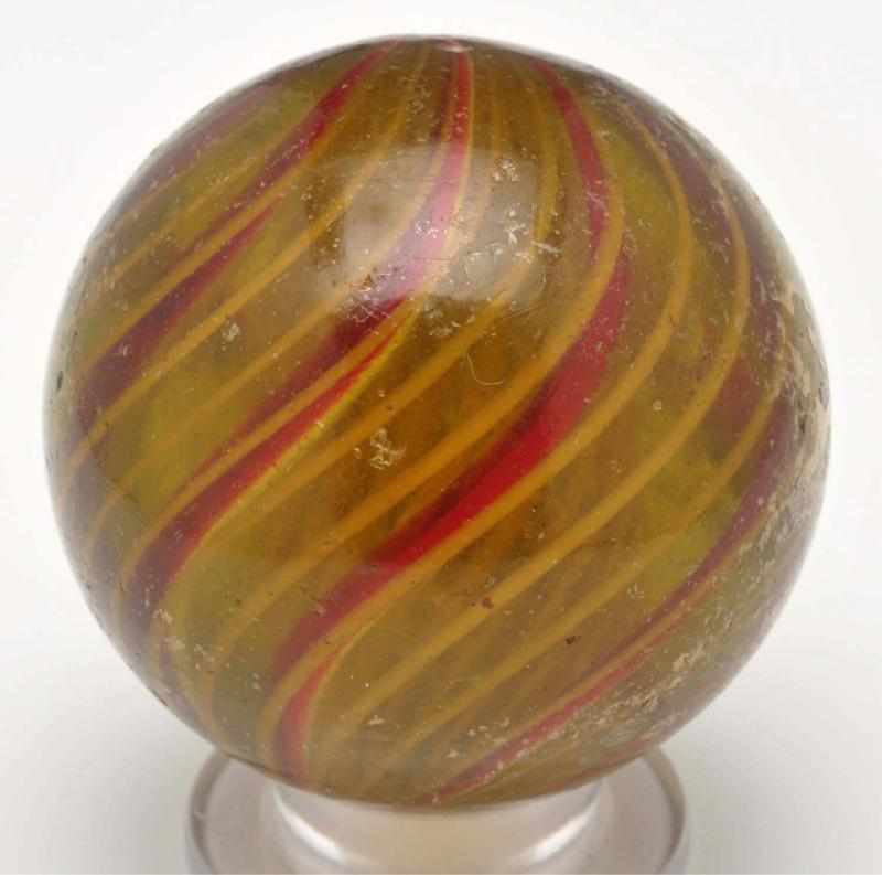 Appraisal: Rare -Stage Yellow Glass Latticino Swirl Marble Description Yellow glass