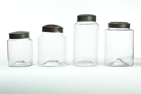 Appraisal: FOUR BLOWN GLASS CANISTERS American mid th century Clear with