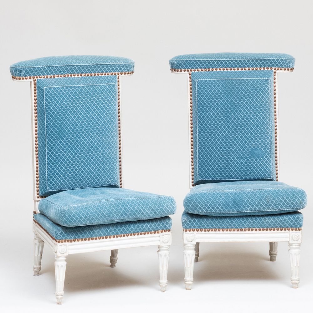 Appraisal: Pair of Louis XVI Style White Painted and Upholstered Prie