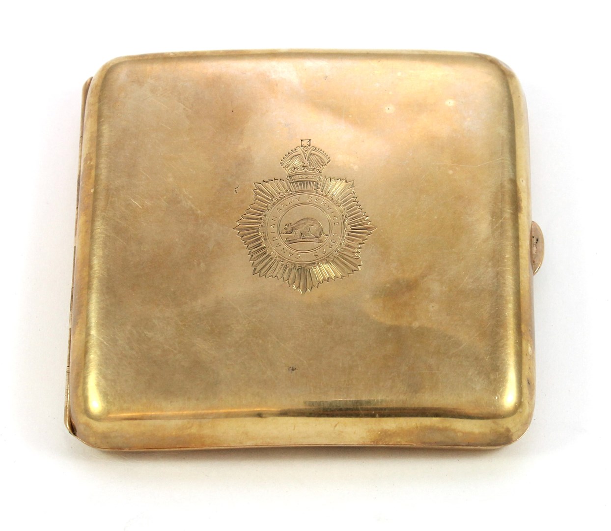 Appraisal: A ct gold curved rectangular cigarette case the cover engraved