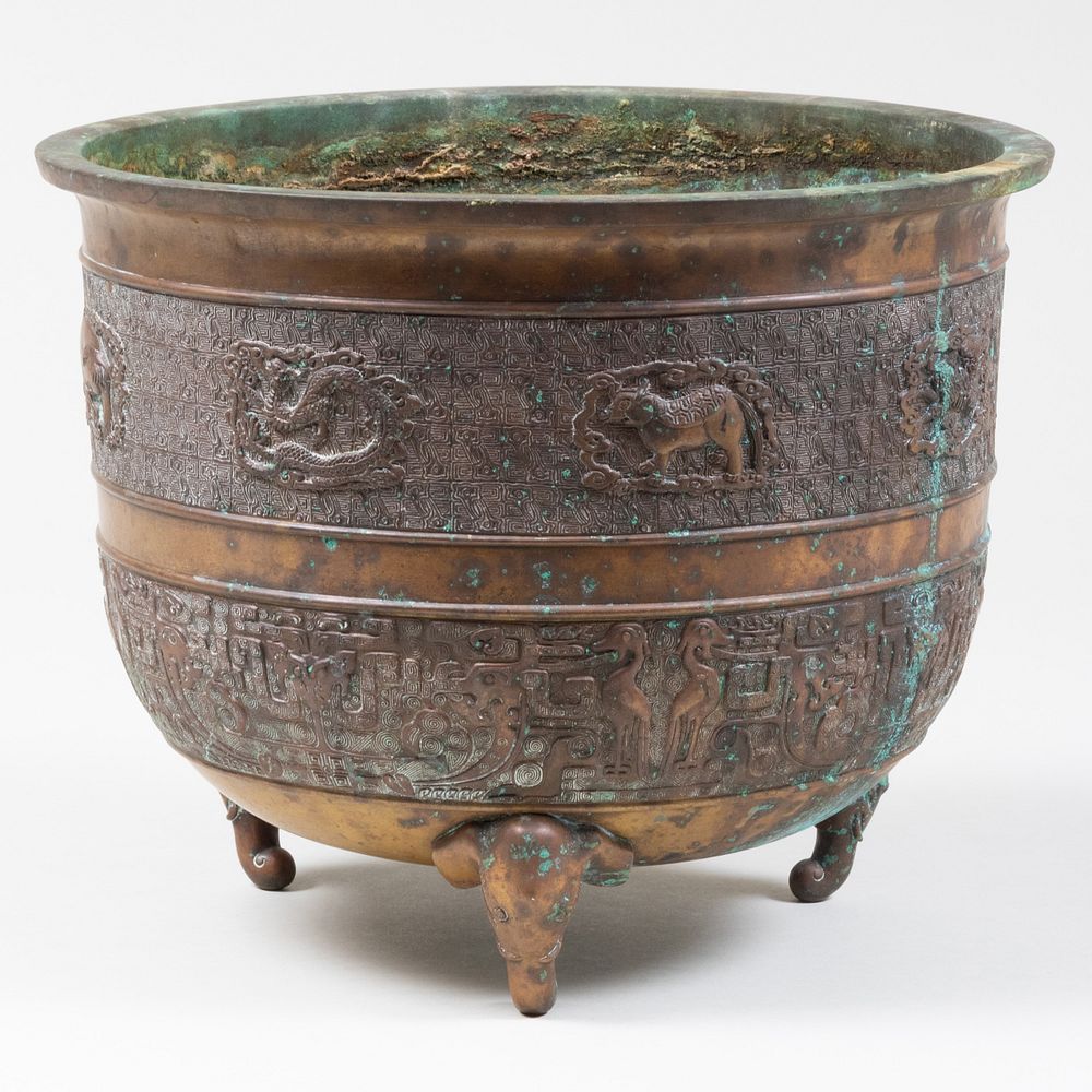 Appraisal: Chinese Bronze Censer Cast with Archaistic Symbols x in diam