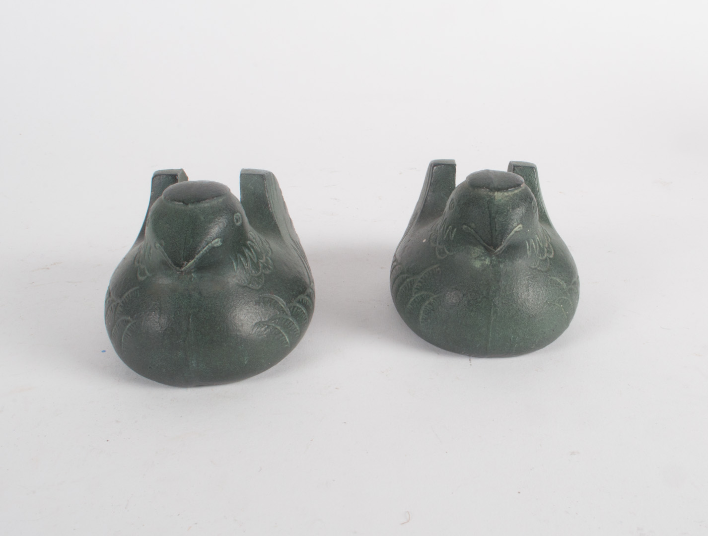 Appraisal: Pair of iron bird weights