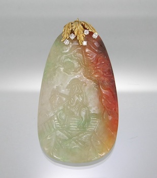 Appraisal: A Finely Carved Jade and Diamond Pendant From a famous