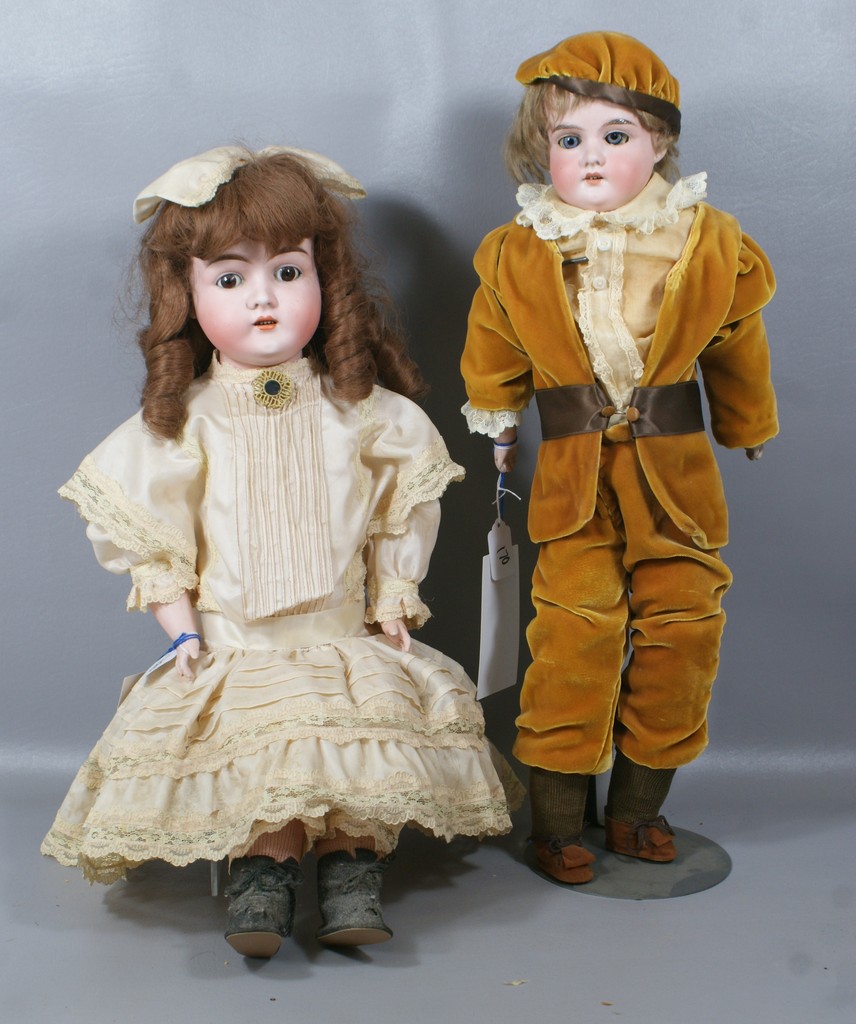 Appraisal: German Bisque Shoulder Head Dolls the larger is incised brown