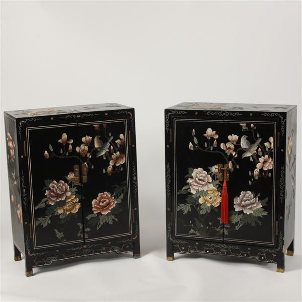 Appraisal: Pair of Chinese black lacquer two-door cabinets painted with peony