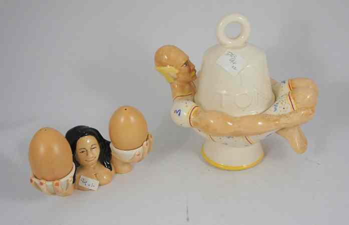 Appraisal: A Lustre Pottery Strongman Bowl and Eggcup made for the