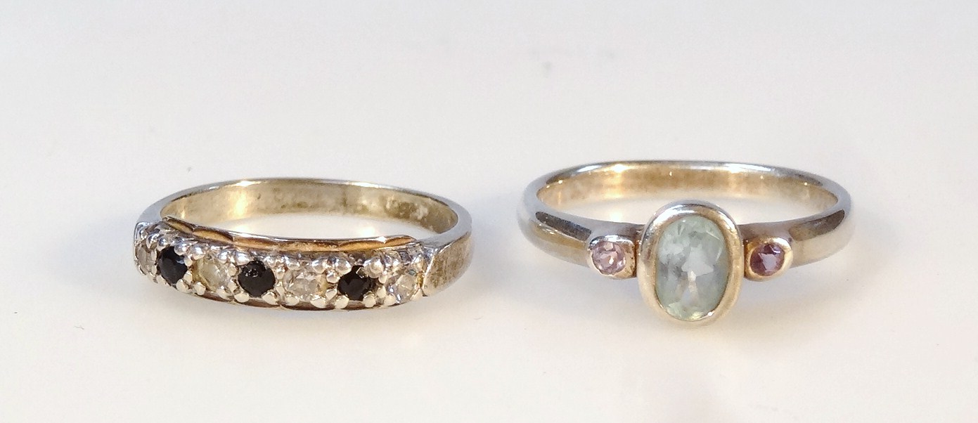 Appraisal: Two ladies' dress rings to include half eternity set with