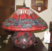 Appraisal: A RED DRAGON FLY STAINED AND LEADED GLASS TABLE LAMP