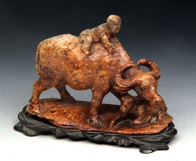 Appraisal: AN ANTIQUE CHINESE SOAP STONE FIGURE of an oxen with