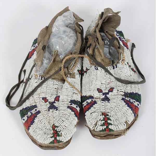 Appraisal: Cheyenne Beaded Hide Moccasins thread and sinew-sewn and beaded using