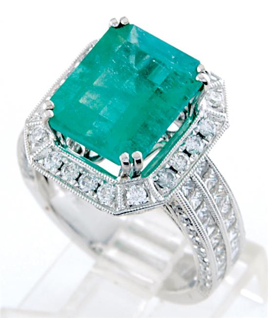 Appraisal: Colombian emerald and diamond ring emerald-cut emerald ct with round